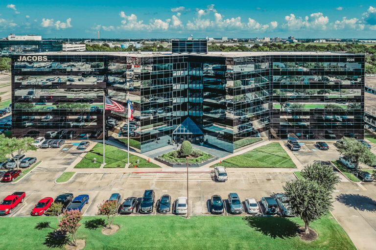 View of the front of the Jacobs Engineering Office Building at NASA’s Johnson Space Center complex.