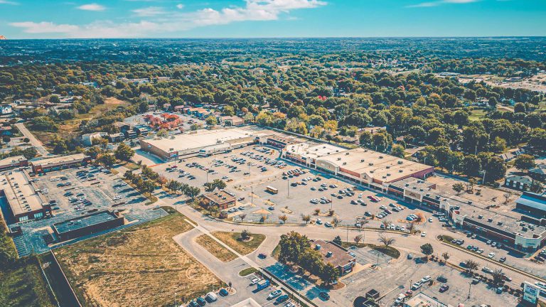 Aerial view of shopping center complex.